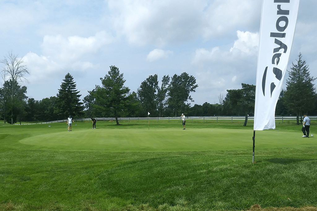 tournament players on golf course